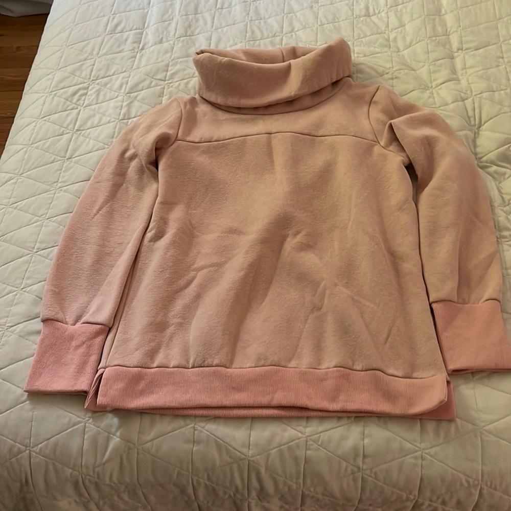 Pink turtleneck fleece lined sweater